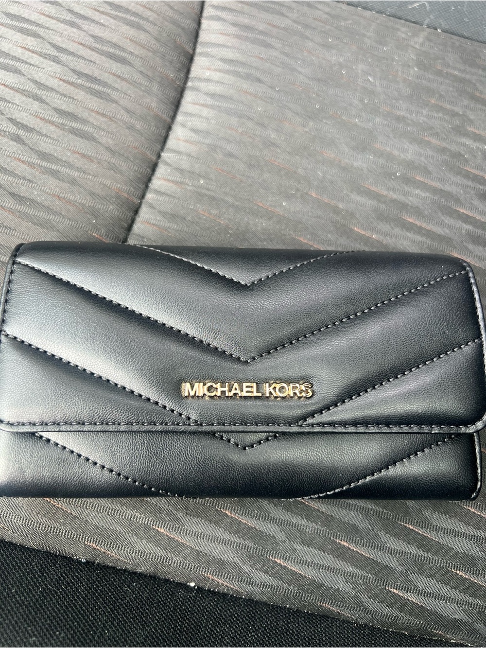 Michael Kors Black Quilted Zip Wallet with Gold Hardware
